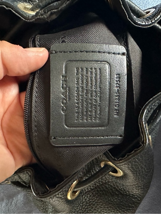 Black Coach pebbled leather mini turnlock rucksack
